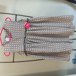 Girls dress with flower detail